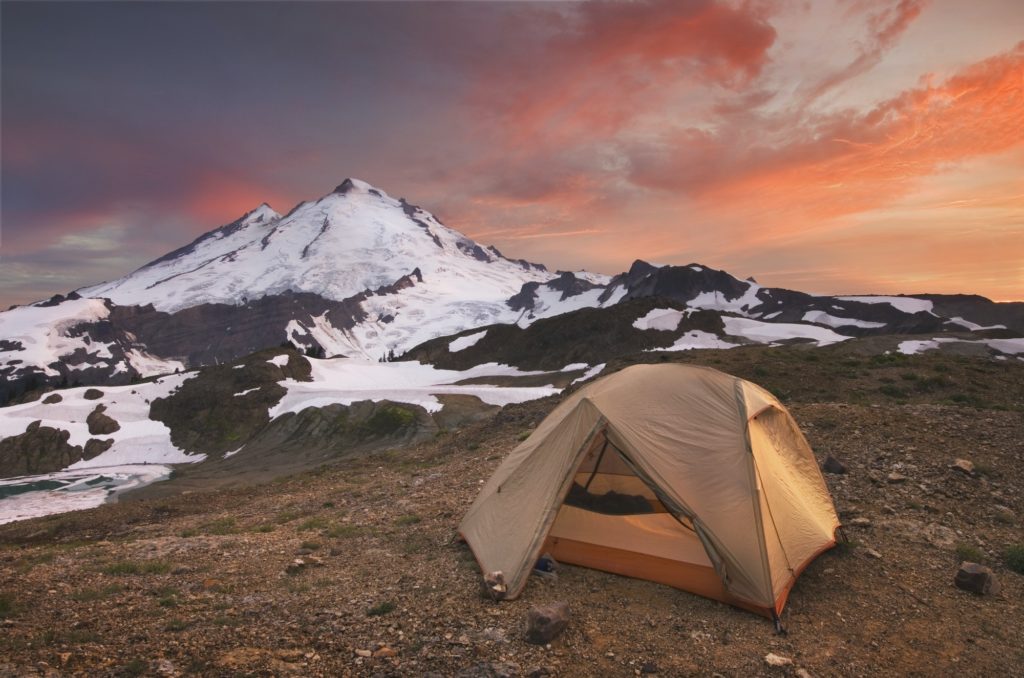 54844,Tent at campsite in snowy mountain landscape